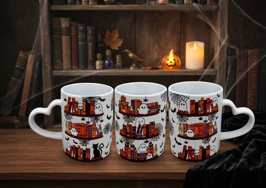 Keramiktasse Spooky Bookshelf mit Herzhenkel 300ml, drei Ansichten mit Geistern, Büchern & Fledermäusen, Halloween-Deko – von fks-design
