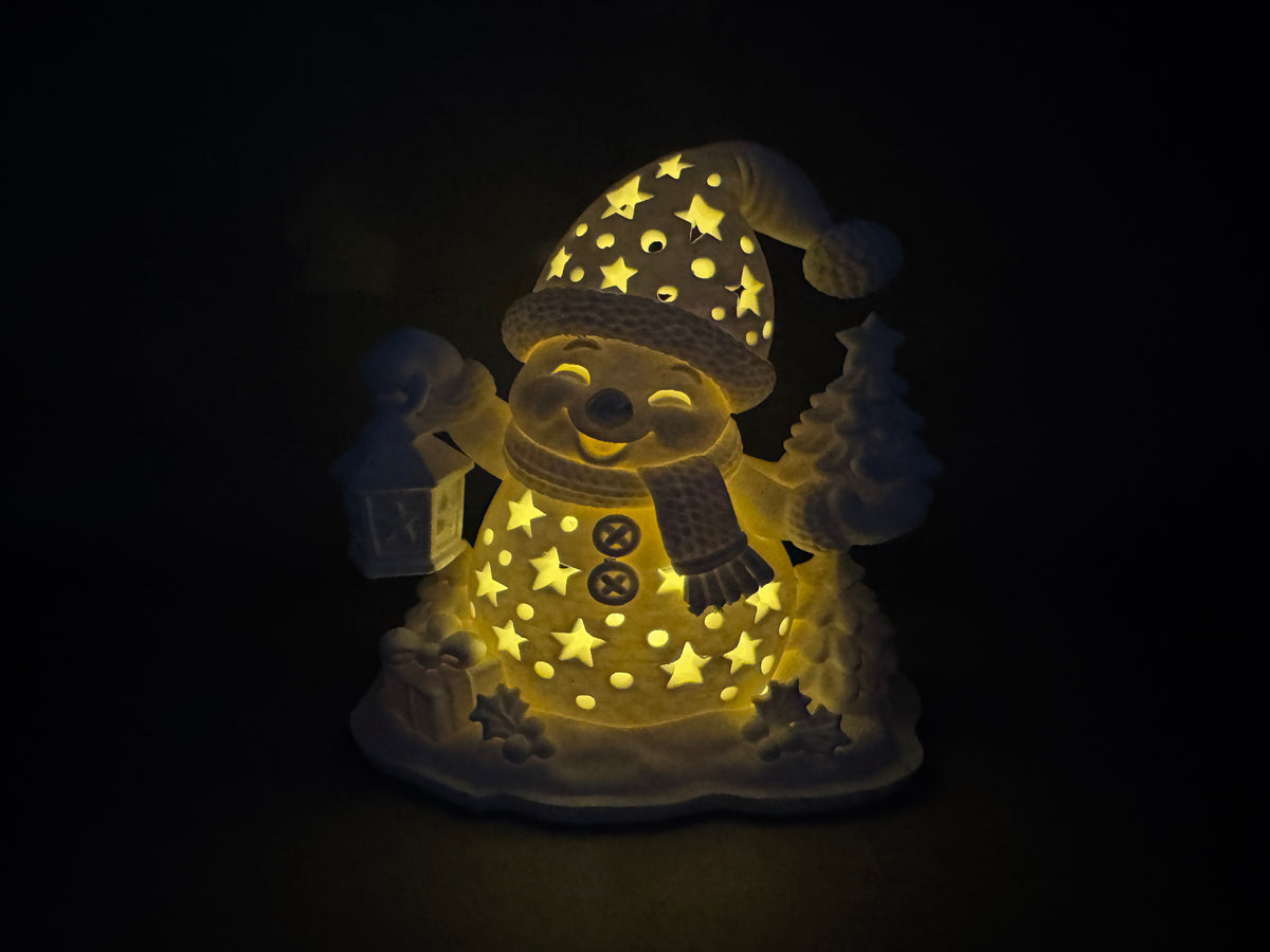 Beleuchteter 3D-Druck LED-Teelichthalter Schneemann mit warm leuchtenden Sternen im Dunkeln von fks-design
