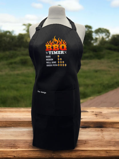 Unisex Grillschürze BBQ Timer schwarz mit DTF-Druck Vorderansicht von fks-design
